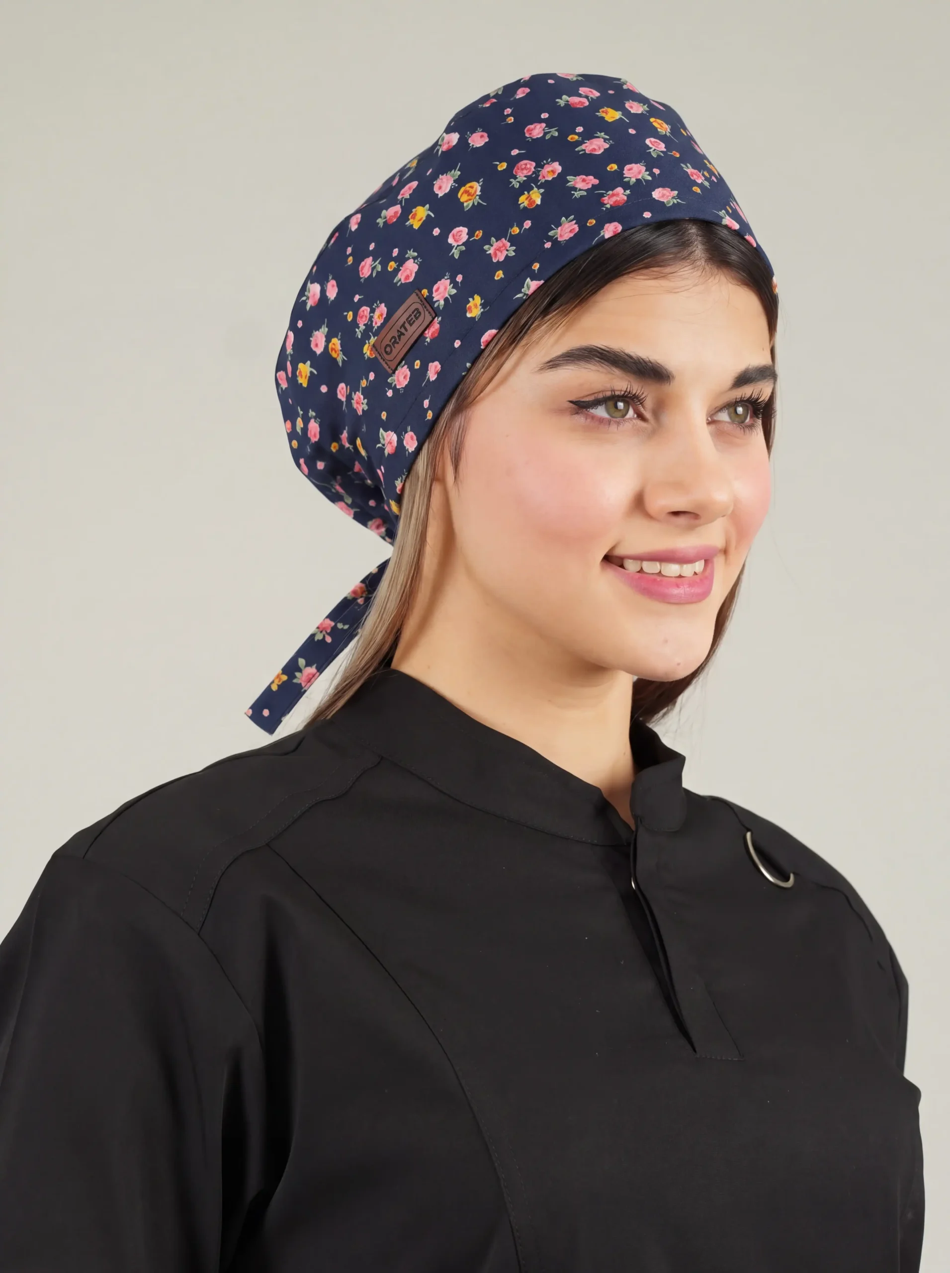 1000351638 کلاه جراحی مدل ساده طرح گل زمینه سرمه ای کد A31 - تصویر 1